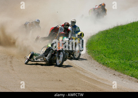 Motorcycle sidecars, international motorcycle race on a dirt track speedway in Muehldorf am Inn, Upper Bavaria, Bavaria, German Stock Photo