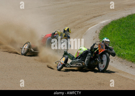 Motorcycle sidecars, international motorcycle race on a dirt track speedway in Muehldorf am Inn, Upper Bavaria, Bavaria, German Stock Photo