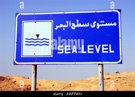 Sign at sea level between Amman and the Dead Sea, Jordan Stock Photo