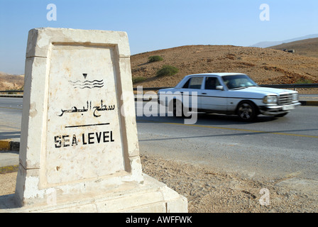 Sign at sea level between Amman and the Dead Sea, Jordan Stock Photo