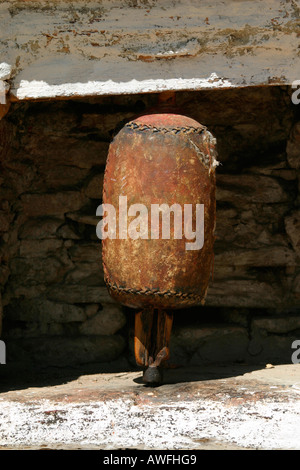 A very ancient tibetan spinning prayer wheels, Bhutan Stock Photo