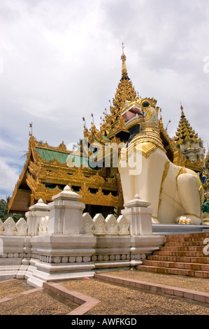 Stock photograph of Chinthe guardian at the entry to the golden Shwedagon Pagoda in central Yangon Myanmar Stock Photo