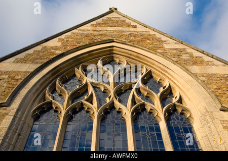 Angled view looking up at a church window Stock Photo