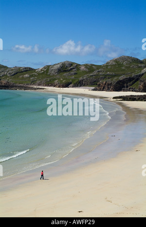dh  OLDSHOREMORE BAY SUTHERLAND Stunning Scottish sands bay Woman walking coast beach aerial scotland sand view beaches walk britain uk tourist white Stock Photo