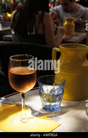 Vin Gris and yellow water Carafe Stock Photo