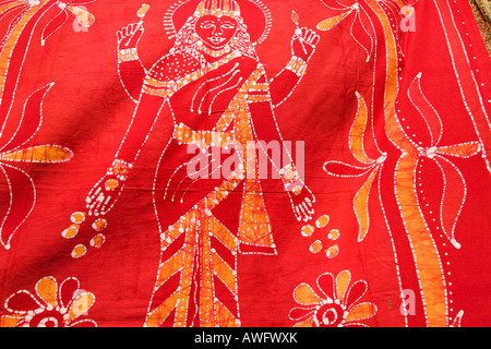 CALIFORNIA Santa Barbara Colorful pattern and design on red Indian fabric woman and trees Stock Photo