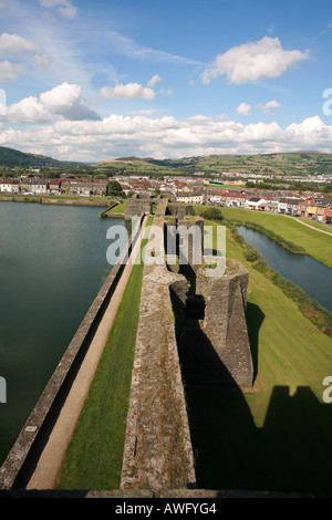 Aerial view of Caerphilly Castle wall ruins water filled moat and inner lake a popular tourist attraction monument South Wales Stock Photo