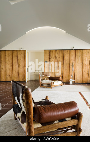 sitting room with vaulted ceiling in penthouse apartment in 1930s Modernist block in Highgate Stock Photo