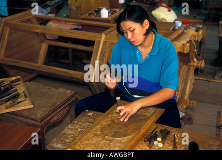 Thai woman, woodcarver, woodcarving, woodwork, woodworker, woodworking, Damnoen Saduak, Ratchaburi Province, Thailand, Southeast Asia, Asia Stock Photo