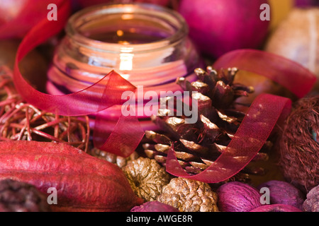 candle or tea light with pot pourri Christmas decorations Stock Photo