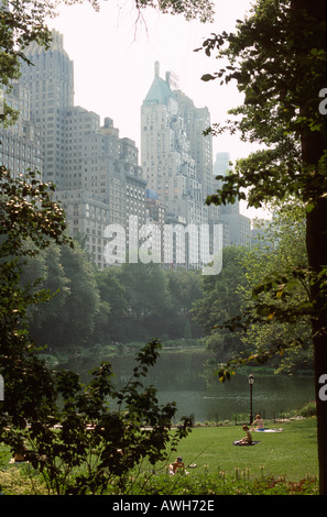 View of The Pond and the Essex House Hotel, Central Park, New York City, New York, USA