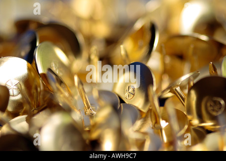 Close up of gold drawing pins Stock Photo