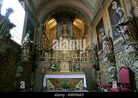 A guilded alter inside the cathedral of Velha itself inside the citadel of Velha of Faro Portugal Stock Photo