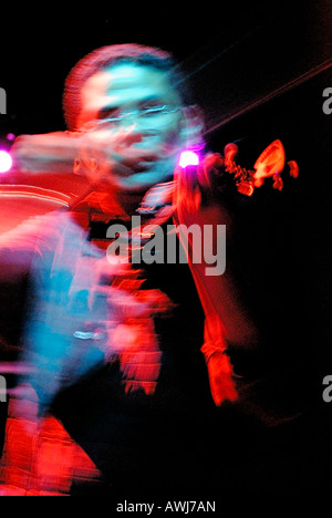 Omar Puente playing violin with Courtney Pine at The Opera House in Bournemouth Stock Photo