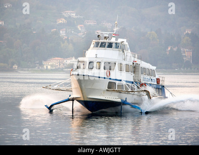 Hydrofoil boat approaches Bellagio Lake Como Italy Stock Photo