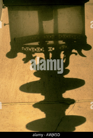 France, Paris, shadow of street lamp on wall Stock Photo