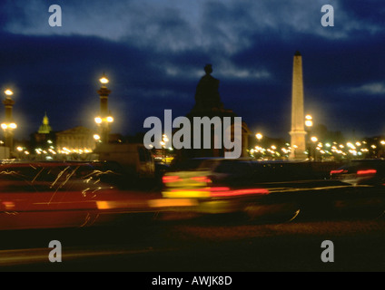 France, Paris, traffic in Place de la Concorde at night Stock Photo