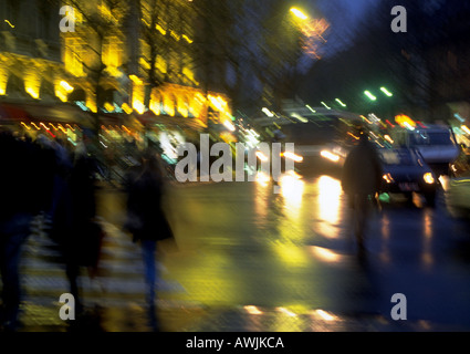 France, Paris, street scene at night, blurred Stock Photo