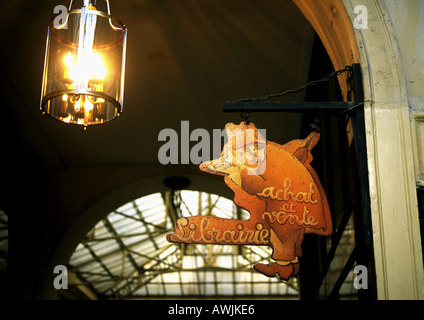 French bookshop sign with hanging light. Stock Photo