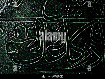 Arabic carved in bronze, close-up Stock Photo