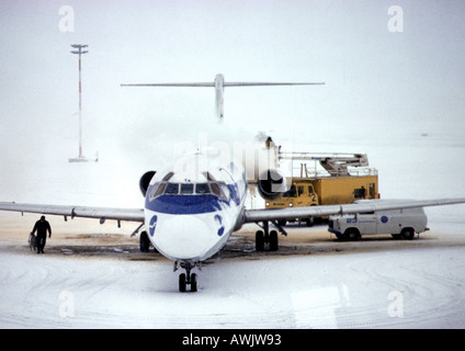 Finland, plane on snowy runway Stock Photo