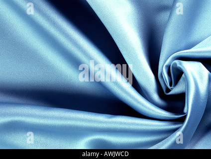 Folds in blue satin, full frame Stock Photo
