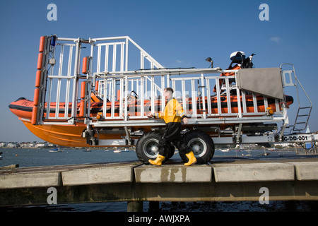 Washing down the Mudeford lifeboat after a job. Stock Photo