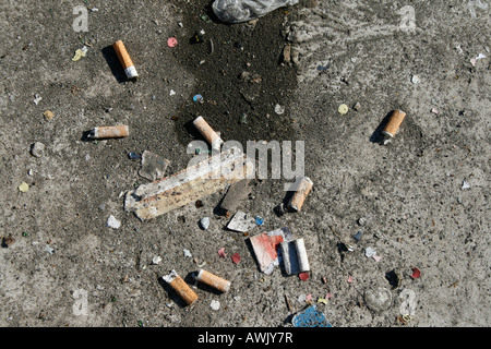 cigarette stubs on road Stock Photo