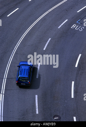 Blue car on highway, birdseye view. Stock Photo