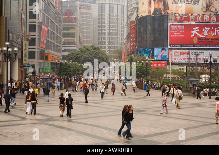 Pedestrians in the busy shopping centre of Chongqing, The People's Republic of China Stock Photo