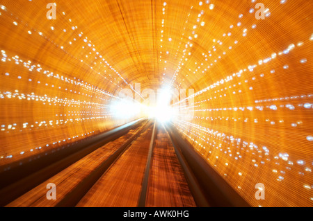 The colourful Bund Sightseeing Tunnel train under the Huang Pu River connecting Puxi and Pudong districts in Shanghai China Asia Stock Photo