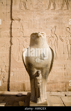 Statue of the god Horus in courtyard of temple of Edfu in Egypt Stock Photo