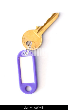 Close up view of a key and plastic fob against a white background Stock Photo