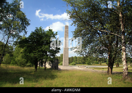 The Obelisk and Inscription Wall in the main memorial area of the former Nazi concentration camp at Bergen Belsen, Germany. Stock Photo