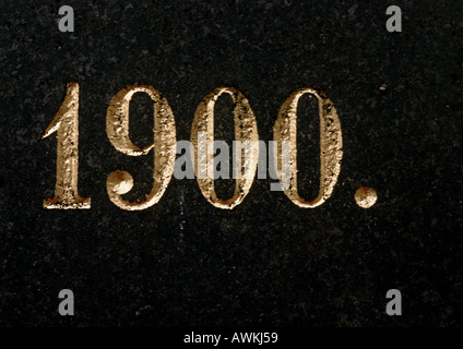 1900 number text date embossed in bronze Stock Photo - Alamy