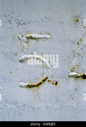 5 text, embossed and rusty on metal surface Stock Photo