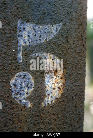 5 text, stenciled on metal surface Stock Photo