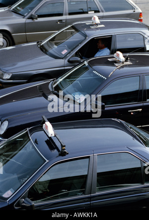 Black taxis in a row Stock Photo