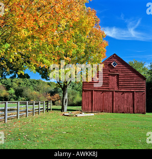 Late 1800's built, red barn on a clear autumn day. Long Island, NY. Stock Photo