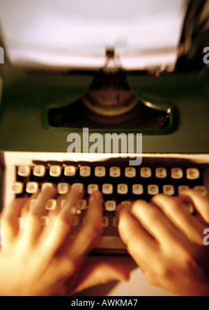 Hands typing on typewriter Stock Photo