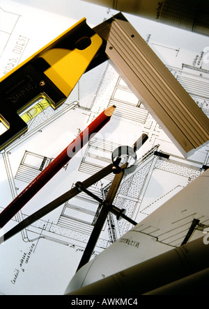 Compass, pencil and level on blueprints, close up Stock Photo