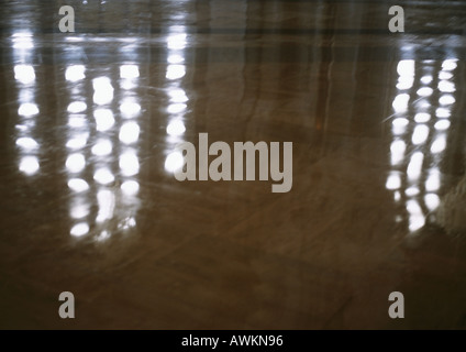 Lights reflected on marble floor Stock Photo