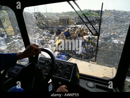 Landfill, view from inside bulldozer Stock Photo