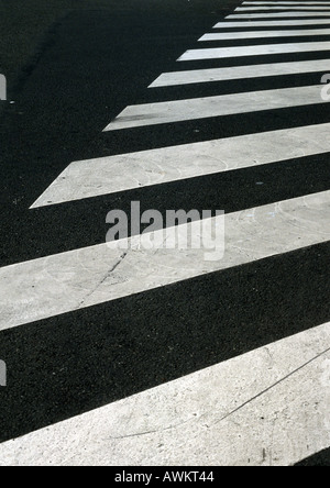 Pedestrian crossing lines on road, close-up Stock Photo