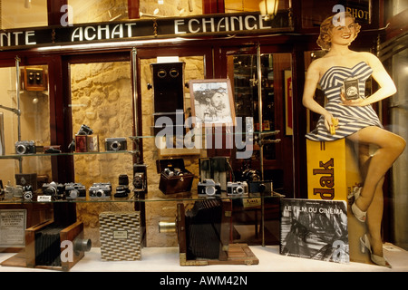 Retro advertising for Kodak Film in the shop window of an antique camera store, Galerie Verdau, Paris, France, Europe Stock Photo