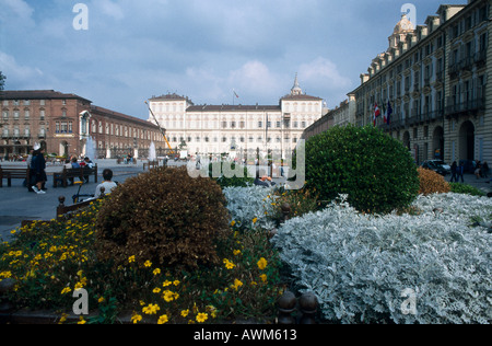 Tourists in front of palace, Royal Palace Of Turin, Turin, Piedmont, Italy Stock Photo