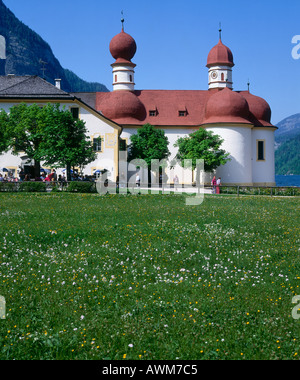 Meadow in front of a church, St Bartholomae, Bavaria, Germany Stock Photo