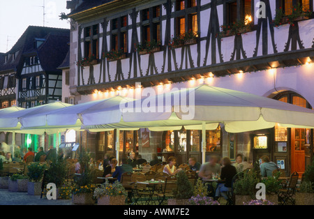 People at restaurant, La Halle Aux Bles, Obernai, Alsace, France Stock Photo
