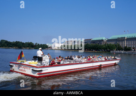 Tourists on tour boat in river, Alster River, Hamburg, Germany Stock Photo