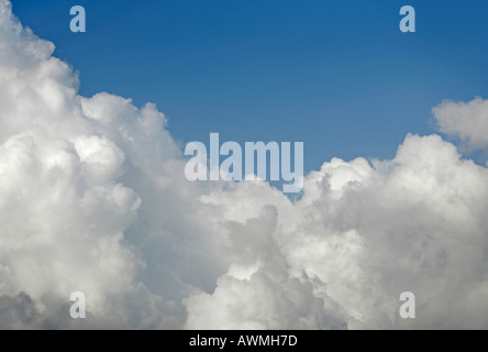 large cumulus clouds and some blue sky Stock Photo